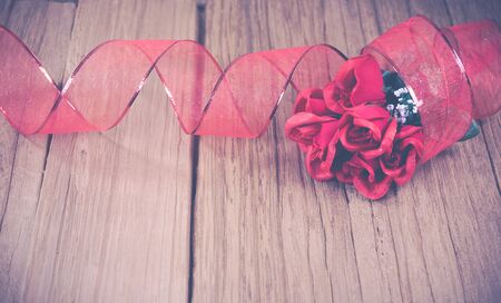 a bunch of rose on the wooden table top ,Ready for display montage,for valentine's day.の写真素材