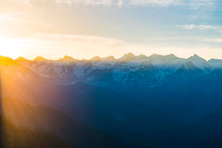 Mountain peaks landscape at sunset.の写真素材