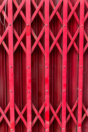 The red fence door very old fashion.の写真素材