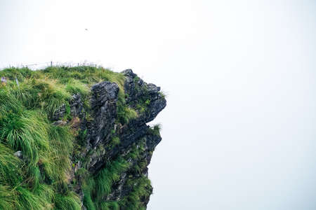 The Phu Che Fha Cliff with The mist background.の写真素材