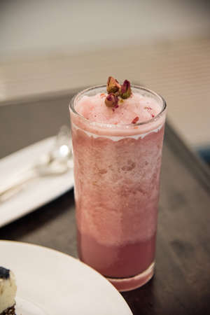A smoothies rose drink top with dry rose .の写真素材