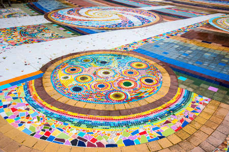 Broken ceramic and ceramic tile decorative on wall and place in temple, mosaic and texture, Thailandの写真素材