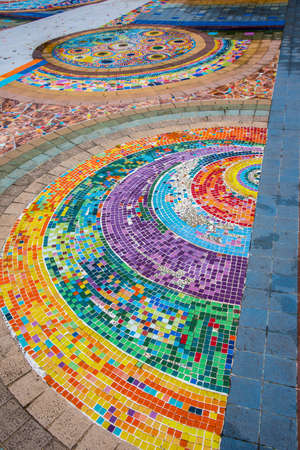 Broken ceramic and ceramic tile decorative on wall and place in temple, mosaic and texture, Thailandの写真素材