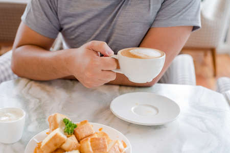 Dessert afternoon tea is a Thai tea sauce with small toast  and ice creamの写真素材