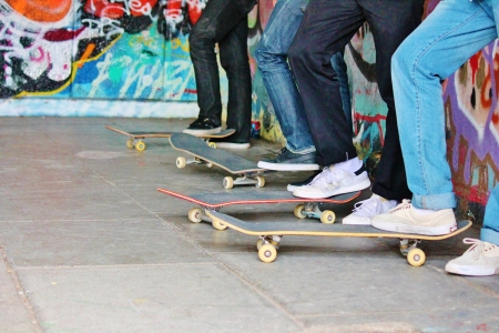 skateboard teen gang with boards in skate parkのeditorial素材
