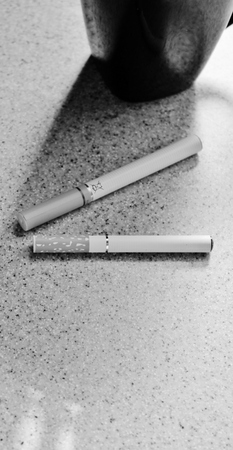 electronic vapour battery powered e cigarette in black and white の写真素材