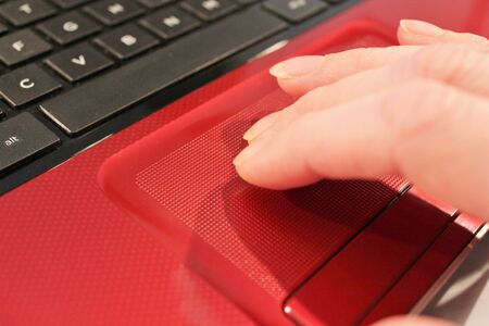 Laptop work hand on mouse mat