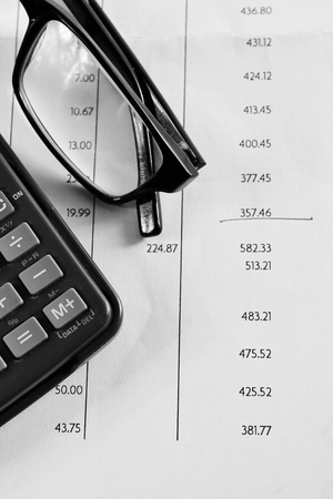 accounting tax Bank statement with pencil and calculatorの写真素材