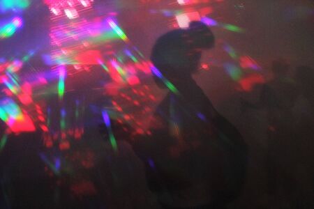 abstract lights nightclub dance party background lights and lasersの写真素材