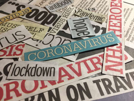 coronavirus headlines from newspapers UK, media collage text: lockdown, social distancing, NHS, crisis, travel ban, vaccineのeditorial素材