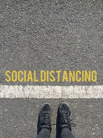 social distancing coronavirus concept - social distance to slow/stop the spread of the virus - stock photoの写真素材