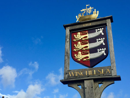 Winchelsea, East Sussex, UK - 20/8/2020: Town sign and coat of arms  situated in the town square by the church Winchelsea, East Sussex, England, UKのeditorial素材