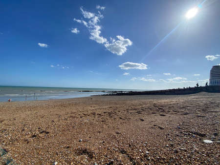 A view of the beach on a sunny day with blue sky.の写真素材