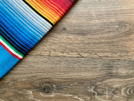 Mexican towel on wooden background, top view. Space for textの写真素材