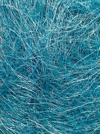 background of blue wool fibers close-up. abstract background and textureの写真素材