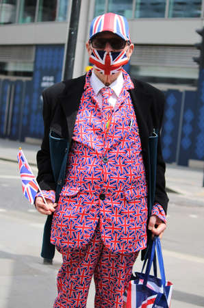 London, Uk- 2nd June 2022: Trooping the colour Platinum Jubilee for Queen Elizabeth, people dressed up in Union Jack flags and red white and blue in London UKのeditorial素材