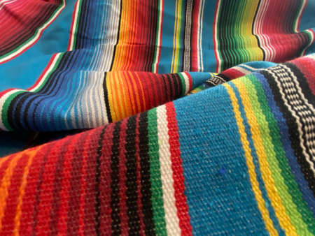 Detail of a traditional mexican woven rug with colorful stripesの写真素材