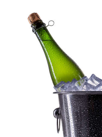 Metal champagne ice bucket with beer isolated on a white background.の写真素材