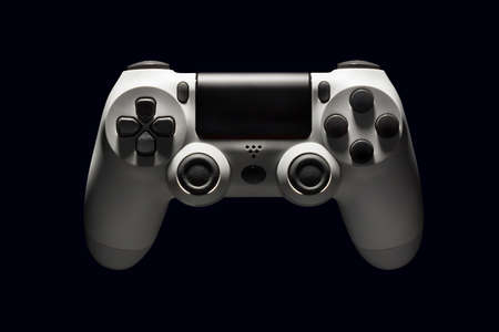 White video game joystick gamepad isolated on a black