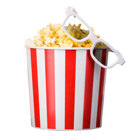 Paper striped bucket with popcorn and 3D glasses isolated on white background with clipping path. Concept of cinema or watching TV.の写真素材
