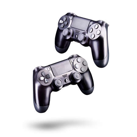 Set of black video game joysticks gamepad isolated on a white background, concept of playing games...