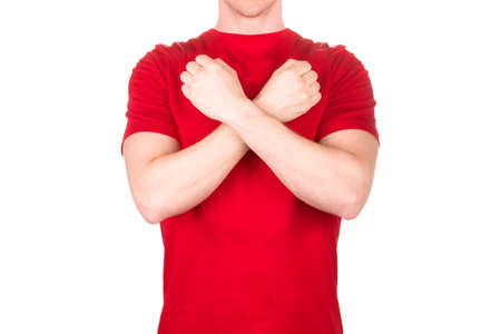 Man in red t-shirt displaying a hostile or aggressive gesture fist bump isolated white background with clipping path. Concept of t shirt template and mock-up for printの写真素材