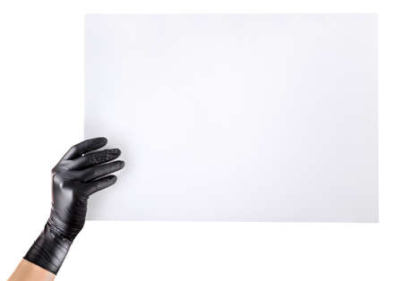 Hand in black gloves showing or holding blank cardboard isolated on white background.の写真素材