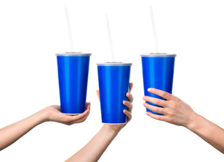 Woman hand holding blue cup isolated on white background with clipping path. Concept of refreshments...