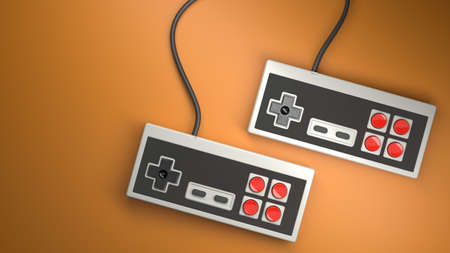 Retro computer gaming controller joystick with red and black buttons on orangeの写真素材