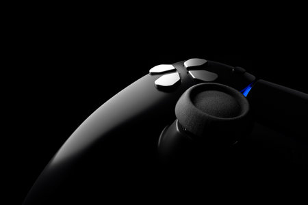Realistic video game controller in noir lights on black table background. 3D rendering of streaming...