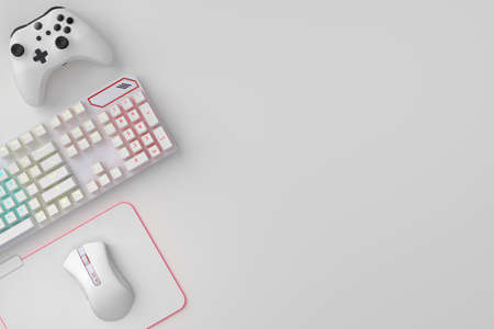 Top view of gamer workspace and gear like mouse, keyboard, joystick, headset on white table background. 3d rendering of accessories for live streaming concept top viewの写真素材