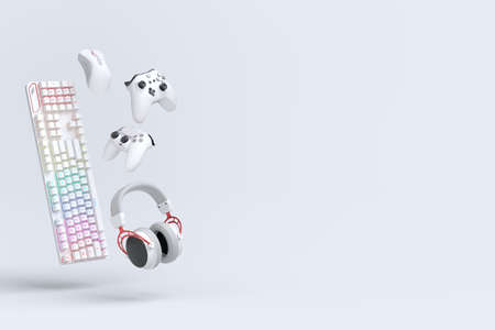 Flying gamer gears like mouse, keyboard, joystick, headset, VR Headset on white table background. 3d...