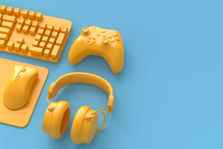 Top view of gamer workspace and monochrome gear like mouse, keyboard, joystick, headset on blue and yellow table background. 3d rendering of accessories for live streaming concept top viewの写真素材
