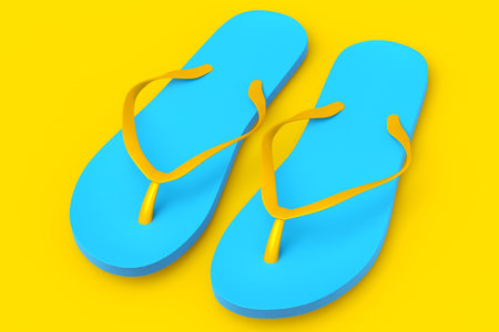 Beach blue flip-flops or sandals isolated on yellow background. 3d render concept of summer family vacationの写真素材