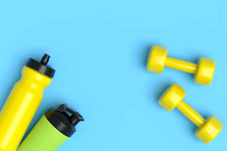 Isometric view of sport equipment like water bottle and dumbbell on blue background. 3d render of...