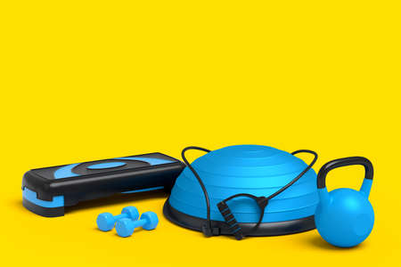 Isometric view of sport equipment like kettlebell, stretch ball and stepper on yellow background. 3d render of power lifting and fitness conceptの写真素材