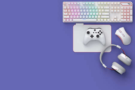 Top view of gamer workspace and gear like mouse, keyboard, joystick, headset on purple table...