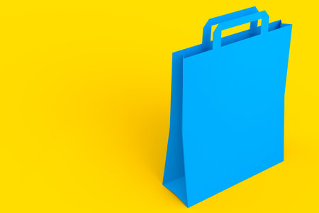 Folded kraft paper bag with handle isolated on yellow background. 3d render concept of online shopping and gift boxingの写真素材