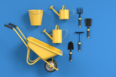 Garden wheelbarrow with garden tools like shovel, rake and fork on blue background. 3d render concept of horticulture and farming suppliesの写真素材