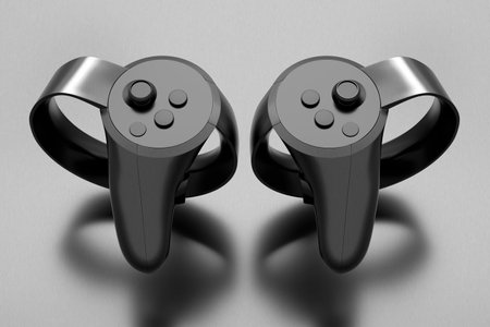 Virtual reality controllers for online gaming with metallic chrome texture on dark background. 3D...