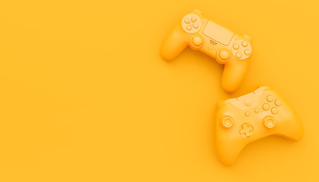 Video game joysticks or gamepads in plain monochrome yellow color background with copy space. 3D render of streaming gear for cloud gaming and gamer workspace conceptの写真素材