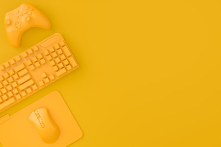 Neatly organized home office setup with tech gadgets like a wireless keyboard, gaming controllers and mouse on monochrome backgroundの写真素材