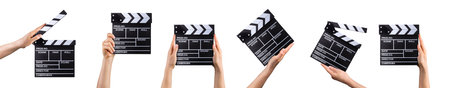 Human hand holding film clapper board isolated on white background with clipping path.の写真素材