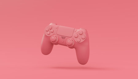 Video game joystick or gamepad in plain monochrome pink color background with copy space. 3D render of streaming gear for cloud gaming and gamer workspace conceptの写真素材