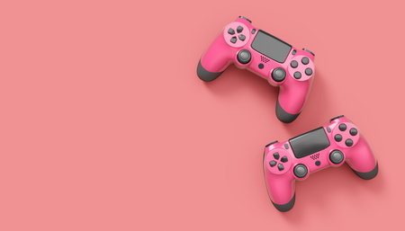 Realistic red video game joysticks or gamepads on pink background. 3D rendering of streaming gear for cloud gaming and gamer workspace conceptの写真素材