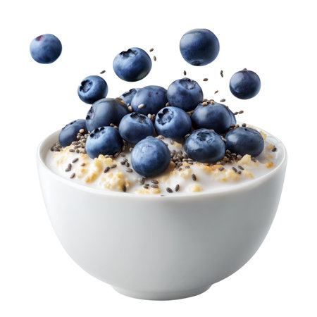 Healthy breakfast. Oatmeal with blueberries and chia seeds isolated on white backgroundの素材