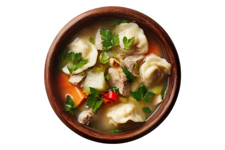 Bowl with tasty meat dumplings and vegetables on white backgroundの素材