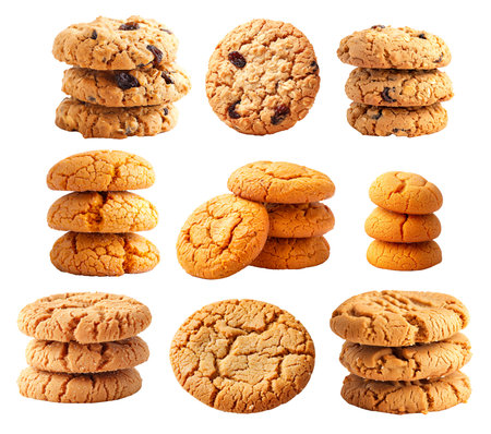 Multiple stacks and groups of assorted crunchy cookies with crispy textures and chocolate chips, isolated on white backgroundの素材