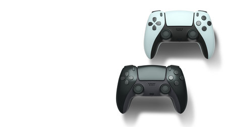 Wireless gaming controllers flying in air isolated on white background with clipping path,...