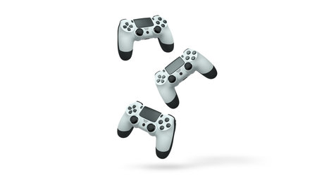 Wireless gaming controllers flying in air isolated on white background with clipping path,...
